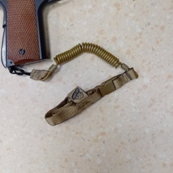 Ремъчка/осигуровка за оръжие или екипировка Canis Latrans